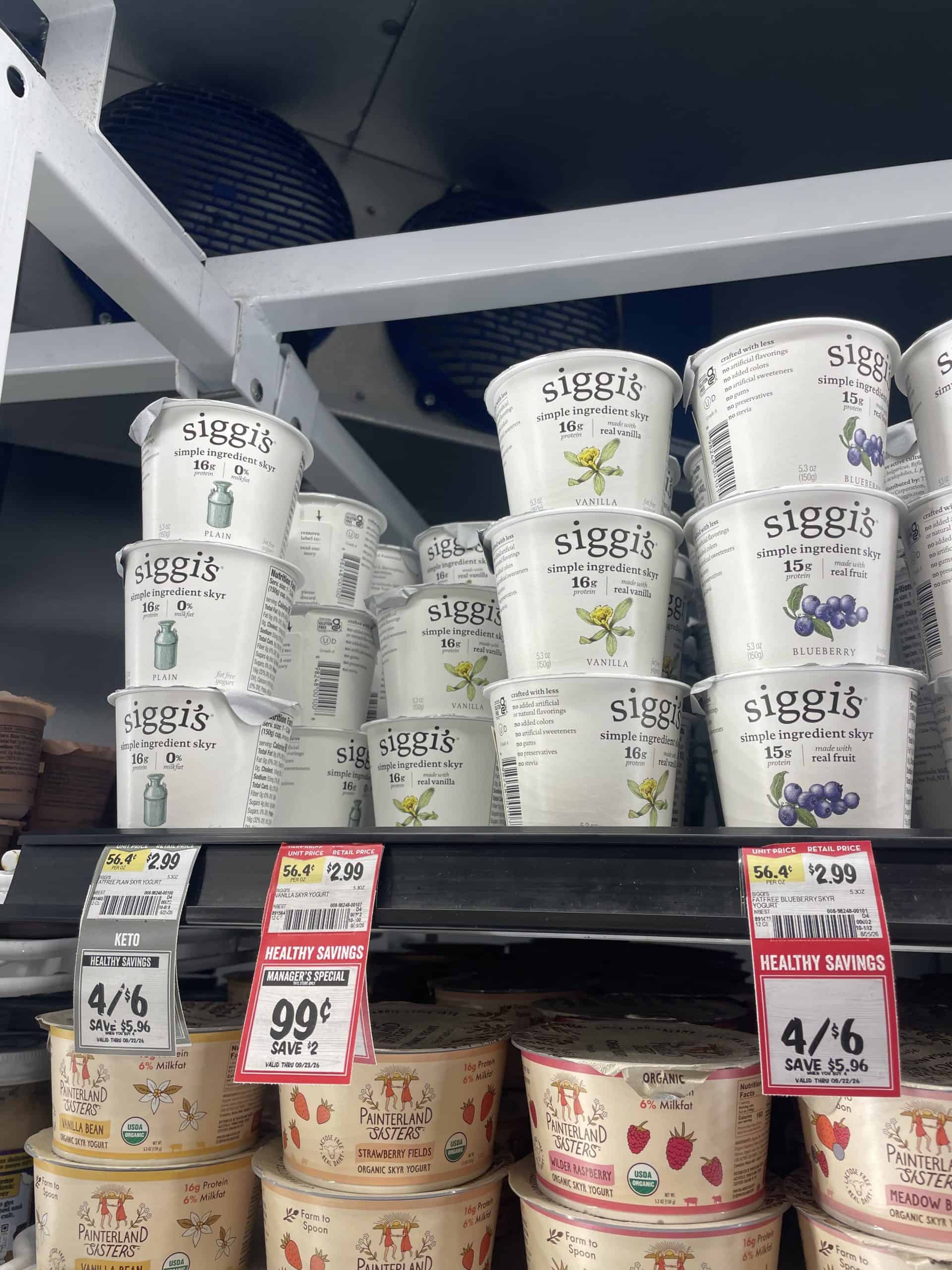 sieges yogurt on a shelf in a grocery store