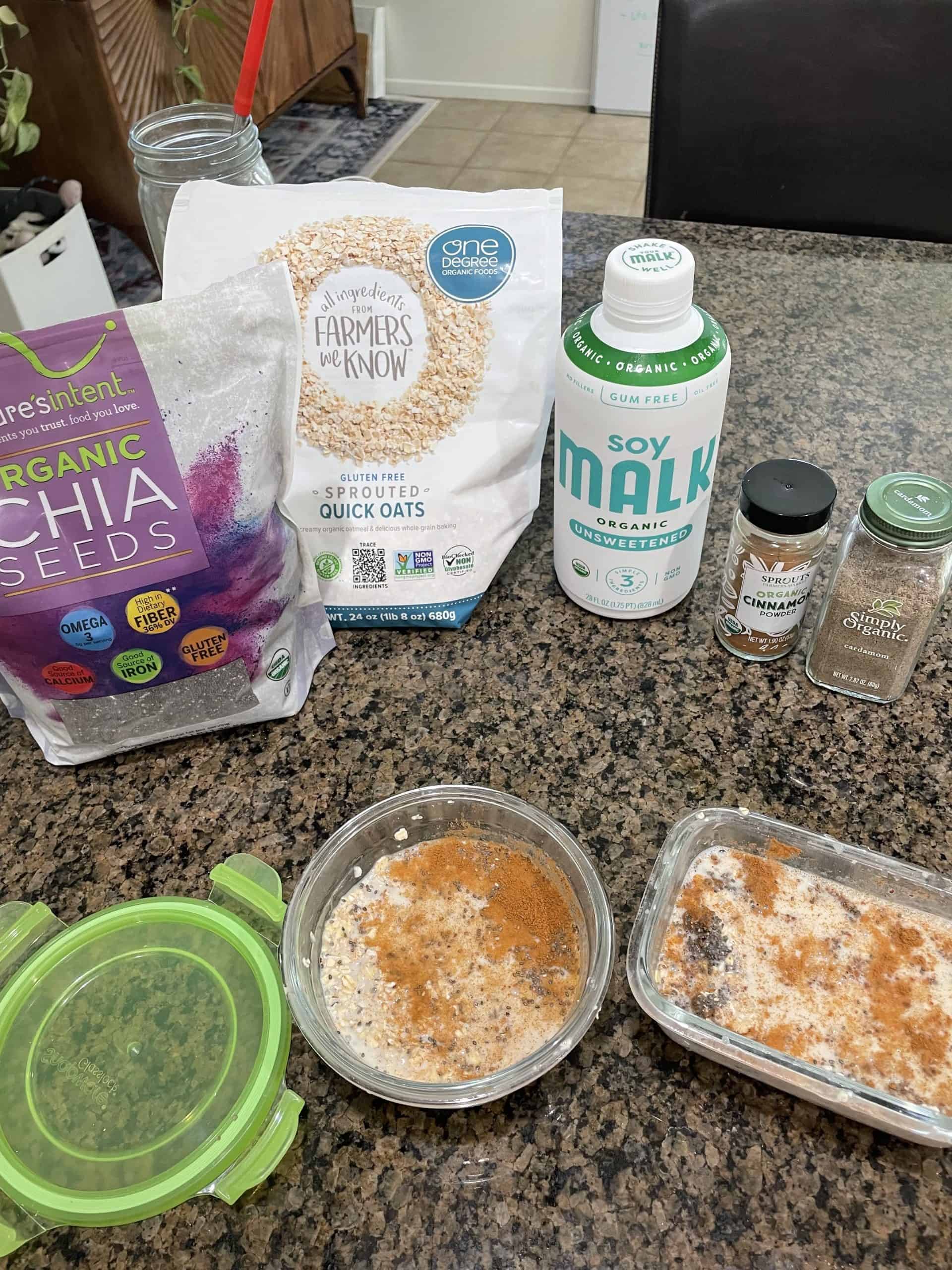 prepped overnight oats with chia seeds, oatmeal, soy milk and spices on a countertop